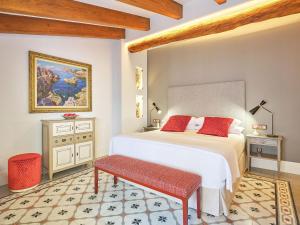 Posteľ alebo postele v izbe v ubytovaní Hotel Gloria de Sant Jaume