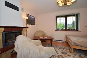 Posedenie v ubytovaní Apartament Kosista