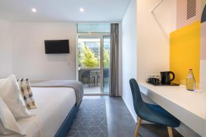TV o dispositivi per l'intrattenimento presso Allegro Madeira - Adults Only