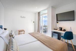 Letto o letti in una camera di Allegro Madeira - Adults Only