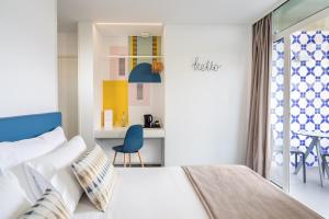 Letto o letti in una camera di Allegro Madeira - Adults Only