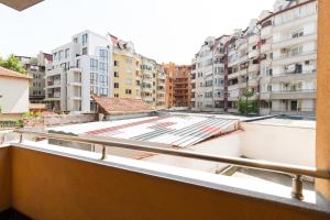 a view from the balcony of a apartment with buildings at Pop your COLORS - Funky and Modern 1BDR Apt by Flat Mаnager in Plovdiv