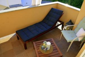 Posezení v ubytování Blue SUNSHINE RAB