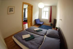 Postel nebo postele na pokoji v ubytování Apartman Egidius