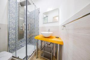 Koupelna v ubytování Arcorosa Apartment + 21 fotografií