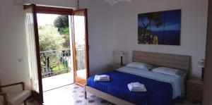 Ένα ή περισσότερα κρεβάτια σε δωμάτιο στο Sorrento Dolce Casa