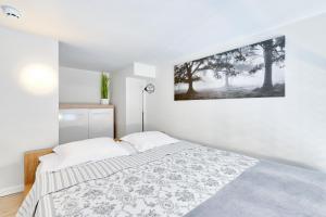Postel nebo postele na pokoji v ubytování Rotermann City Apartments