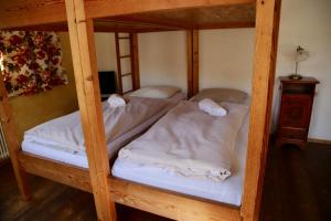 Voodi või voodid majutusasutuse Hotel Schwarzer Adler Sillian toas