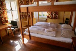 Voodi või voodid majutusasutuse Hotel Schwarzer Adler Sillian toas