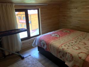 Postel nebo postele na pokoji v ubytování Ay Home Apart&bungalov