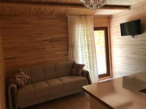 TV a/nebo společenská místnost v ubytování Ay Home Apart&bungalov
