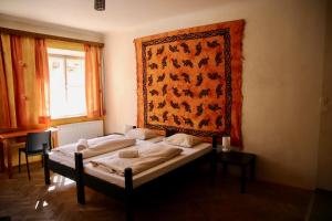 Postel nebo postele na pokoji v ubytování Hotel Schwarzer Adler Sillian