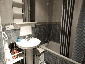 Koupelna v ubytování Apartamento del Rosario + 16 fotografií