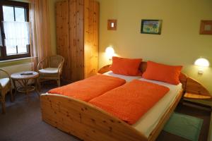 Ein Bett oder Betten in einem Zimmer der Unterkunft Pension Loni Theisen