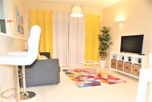 TV a/nebo společenská místnost v ubytování Apartamento Litoral Mar 9