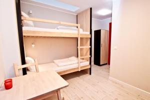 Postel nebo postele na pokoji v ubytování WaterLane Island Hostel&Apartments