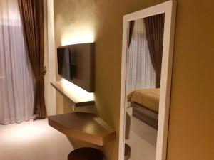 TV o dispositivi per l'intrattenimento presso villa view2 sayriah