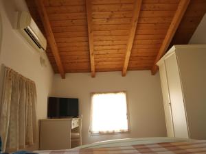 TV a/nebo společenská místnost v ubytování B&B Primula House