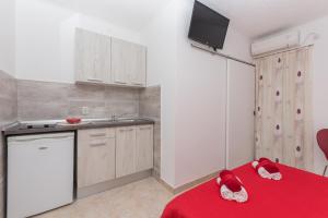 Köök või kööginurk majutusasutuses Apartmani Sol