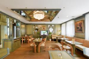 TV a/nebo společenská místnost v ubytování Tulip Inn Beaulieu Lausanne