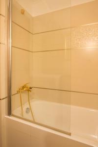 Koupelna v ubytování Poseidon Luxury Apartment