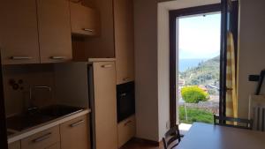 Η κουζίνα ή μικρή κουζίνα στο Casa Luisa +15 φωτογραφίες