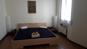 A bed or beds in a room at Il Riposo del Guerriero Guesthouse