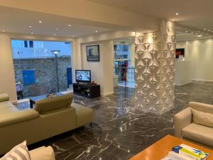 TV a/nebo společenská místnost v ubytování Nancy Hotel