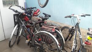 a group of bikes parked next to a wall at Penzion Kapitan in Jindřichŭv Hradec