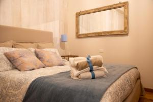 Postel nebo postele na pokoji v ubytování Casa Vacanze Gombito 4 Bergamo Alta
