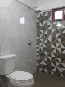 Ett badrum på Casa CheJum Bacalar