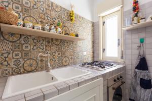 A kitchen or kitchenette at Splendida Casa A Taormina " Casa di Anna "
