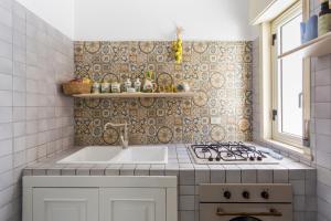 A kitchen or kitchenette at Splendida Casa A Taormina " Casa di Anna "