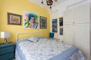 Posteľ alebo postele v izbe v ubytovaní Splendida Casa A Taormina " Casa di Anna "