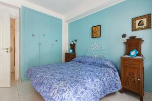 A bed or beds in a room at Splendida Casa A Taormina " Casa di Anna "