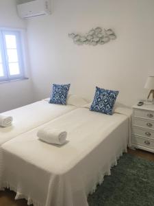Ένα ή περισσότερα κρεβάτια σε δωμάτιο στο Retromovement House
