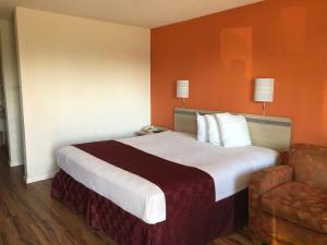 Cama o camas de una habitación en Delta Inn