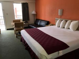 Cama o camas de una habitación en Delta Inn