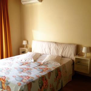 En eller flere senger på et rom på Bed&Breakfast La Zagara