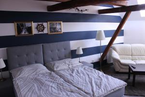 Postel nebo postele na pokoji v ubytování Penzion Nautica