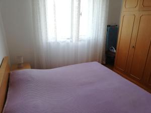 Posteľ alebo postele v izbe v ubytovaní Spacious family apartment with parking in the shade and barbecue house