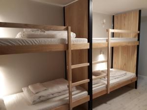Postel nebo postele na pokoji v ubytování WaterLane Island Hostel&Apartments
