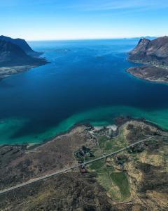 an aerial view of a large body of water at Rystad Lofoten Camping in Rystad