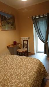 Postel nebo postele na pokoji v ubytování B&B Maison Odille