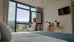 Łóżko lub łóżka w pokoju w obiekcie Hotel Costa da Morte