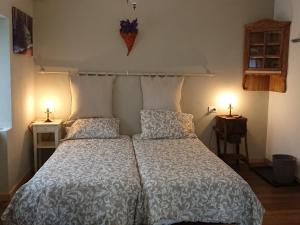 Postel nebo postele na pokoji v ubytování B&B Maison Odille