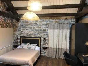 Cama o camas de una habitación en Hostel-Albergue Monte Perdido