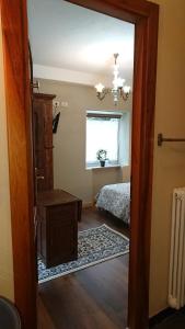Postel nebo postele na pokoji v ubytování B&B Maison Odille