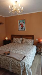 Postel nebo postele na pokoji v ubytování B&B Maison Odille