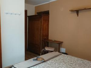 Postel nebo postele na pokoji v ubytování B&B Maison Odille